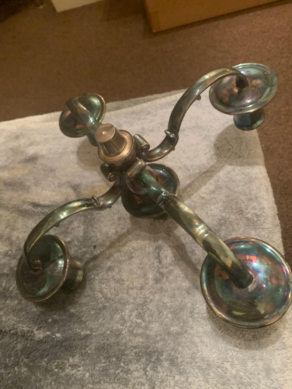 Tarnished metal item before polishing